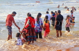 SRI LANKA, Negombo, Negombo Beach Park, Sunday evening crowds enjoying the sea, SLK6260JPL