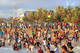 SRI LANKA, Negombo, Negombo Beach Park, Sunday evening crowds enjoying the sea, SLK6278JPL