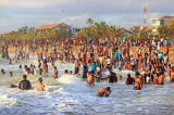 SRI LANKA, Negombo, Negombo Beach Park, Sunday evening crowds enjoying the sea, SLK6282JPL