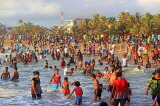 SRI LANKA, Negombo, Negombo Beach Park, Sunday evening crowds enjoying the sea, SLK6284JPL