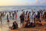 SRI LANKA, Negombo, Negombo Beach Park, Sunday evening crowds enjoying the sea, SLK6290JPL