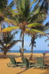 SRI LANKA, Negombo, beach, coconut trees, and sunbeds SLK6115JPL