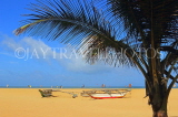 SRI LANKA, Negombo, beach, fishing boats and coconut tree, SLK6327JPL
