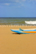 SRI LANKA, Negombo, beach, sea and small fishing boat, SLK3539JPL