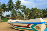 SRI LANKA, Negombo, beach with coconut trees and motor boat, SLK2432JPL