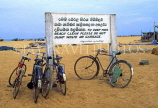 SRI LANKA, Negombo, bicycles against signpost, on beach, SLK1528JPL