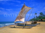 SRI LANKA, Negombo, catamaran (traditional fishing boat) on beach, SLK1545JPL