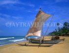 SRI LANKA, Negombo, catamaran (traditional fishing boat) on beach, SLK1610JPL