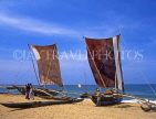 SRI LANKA, Negombo, catamarans (traditional fishing boats) on beach, SLK1611JPL