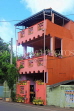SRI LANKA, Negombo, coastal residential street, colourful houses, SLK6073JPL