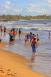 SRI LANKA, Negombo, evening by the seaside, people enjoying paddling, SLK5937JPL