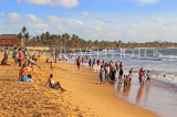 SRI LANKA, Negombo, evening by the seaside, people enjoying paddling, SLK5938JPL