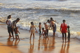 SRI LANKA, Negombo, evening by the seaside, people enjoying paddling, SLK5942JPL