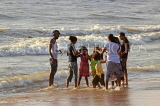 SRI LANKA, Negombo, evening by the seaside, people enjoying paddling, SLK5943JPL