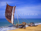 SRI LANKA, Negombo, fishermen pushing out catamaran (traditional fishing boat), SLK1381JPL