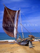 SRI LANKA, Negombo, fishermen pushing out catamaran (traditional fishing boat), SLK1615JPL