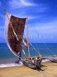 SRI LANKA, Negombo, fishermen pushing out catamaran out to sea, SLK1546JPL