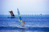 SRI LANKA, Negombo, fishing boats at sea, and tourist windsurfing, SLK1715JPL