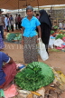 SRI LANKA, Negombo, market, fruit and vegetable market, Betel leaves for sale, and shopper, SLK2678JPL