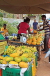 SRI LANKA, Negombo, market, fruit and vegetable market, Papaya stall, vendor and shopper, SK2727JPL