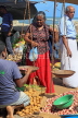 SRI LANKA, Negombo, market, fruit and vegetable market, vendor with scales, SLK6181JPL