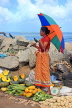 SRI LANKA, Negombo, market, fruit and vegetable market, vendor with with parasol, SLK6182JPL