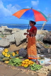 SRI LANKA, Negombo, market, fruit and vegetable market, vendor with with parasol, SLK6184JPL