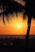 SRI LANKA, Negombo, sea, sunset, coconut tree, and people on beach, SLK3613JPL