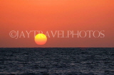 SRI LANKA, Negombo, sea and sun setting over horizon, SLK3522JPL
