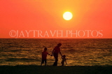 SRI LANKA, Negombo, sea and sunset, family walking along beach, SLK3607JPL