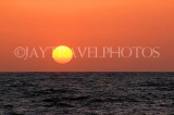 SRI LANKA, Negombo, sea view, and sun setting over horizon, SLK3603JPL