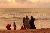 SRI LANKA, Negombo, seaside at dusk, and people on beach, SLK6032JPL