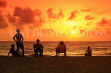 SRI LANKA, Negombo, sunset, sea, and people (tourists) on beach, SLK6359JPL
