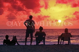 SRI LANKA, Negombo, sunset, sea, and people (tourists) on beach, SLK6362JPL