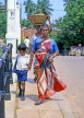 SRI LANKA, Negombo, woman and child along road, SLK2061JPL