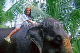 SRI LANKA, south coast, Bentota, child enjoying elephant ride, SLK1757JPL