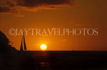 ST LUCIA, Reduit Beach, sunset and sailboat, STL211JPL