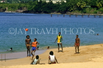 ST LUCIA, locals playing on beach, STL696JPL