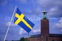 SWEDEN, Stockholm, City Hall (Stadshuset) and national flag, SWE167JPL