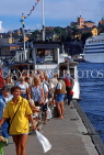 SWEDEN, Stockholm, Old Town (Gamla Stan), commuters getting off ferry, SWE202JPL
