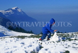 SWITZERLAND, Rigi mountains, Alps scenery, boy playing in snow, SW440JPL