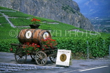 SWITZERLAND, Valais, CHAMOSON, vineyards and wine barrel on cart (wine cellar sign), SW1548JPL