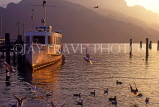 SWITZERLAND, Valais, LAKE LUCERN, boat on lake and dusk view, SW581JPL