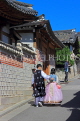 South Korea, SEOUL, Bukchon Hanok Village, couple in Hanbok attire, visiting, SK968JPL