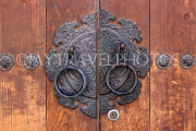 South Korea, SEOUL, Bukchon Hanok Village, house door detail, iron door handle, SK971JPL