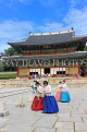 South Korea, SEOUL, Changdeokgung Palace, Injeongjeon (Throne Hall), visitor in Hanbok attire, SK194JPL