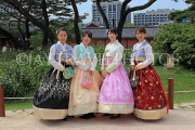 South Korea, SEOUL, Changdeokgung Palace, visitors in Hanbok attire posing for photo, SK222JPL