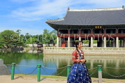 South Korea, SEOUL, Gyeongbokgung Palace, Gyeonghoeru Pavilion, and woman in Hanbok attire, SK362JPL