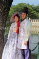 South Korea, SEOUL, Gyeongbokgung Palace, couple in Hanbok attire, SK370JPL