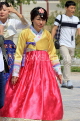 South Korea, SEOUL, Gyeongbokgung Palace, visitor in traditional Hanbok attire, SK458JPL